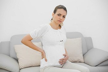 ► Почему возникают боли внизу живота при беременности на ранних сроках?