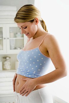 ► Начало беременности: боли, грудь, температура